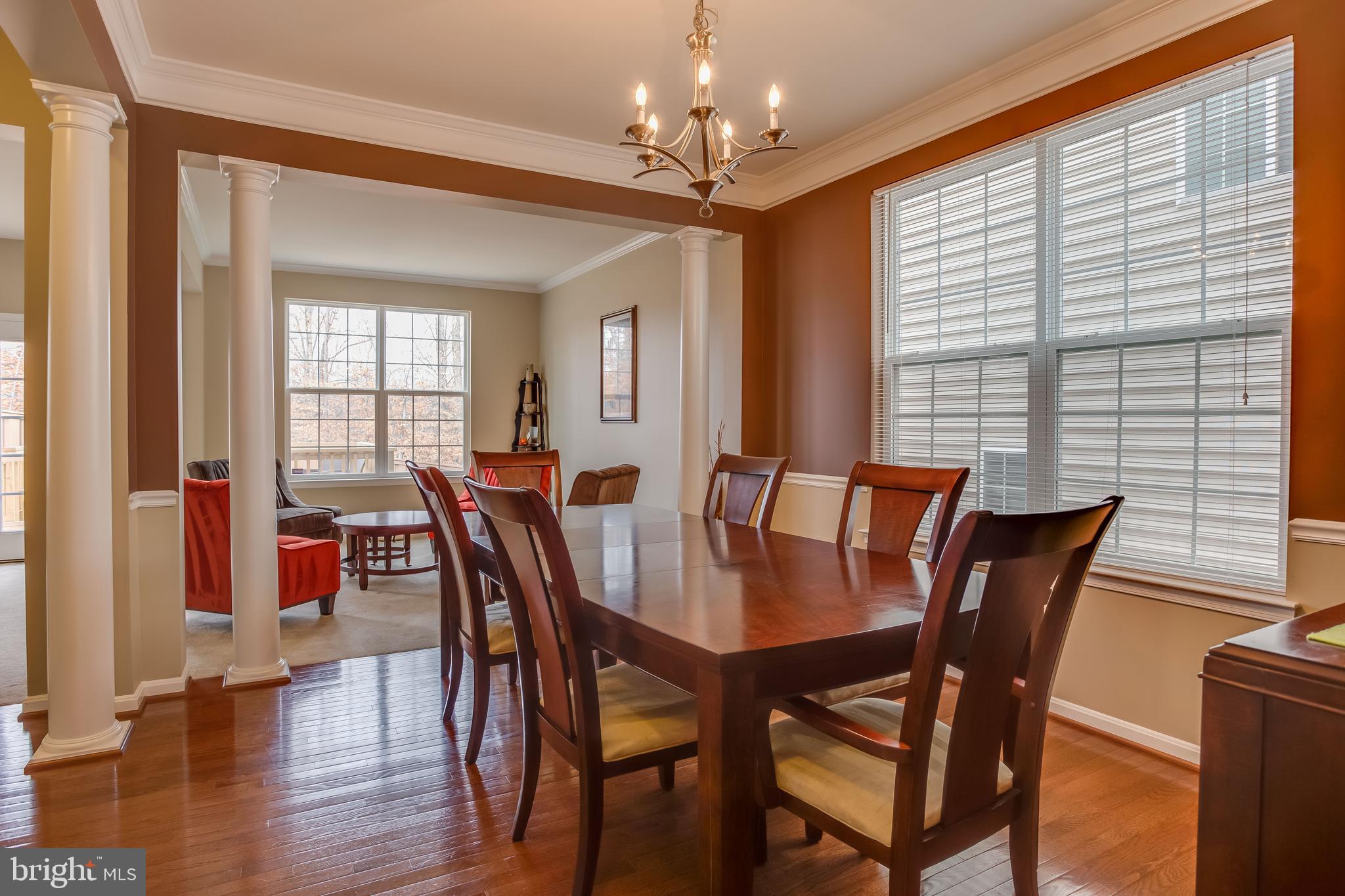 3437 Eagle Ridge Drive Woodbridge, VA 22191 - Photo 14 of 40 a view of a dining room with furniture window and wooden floor