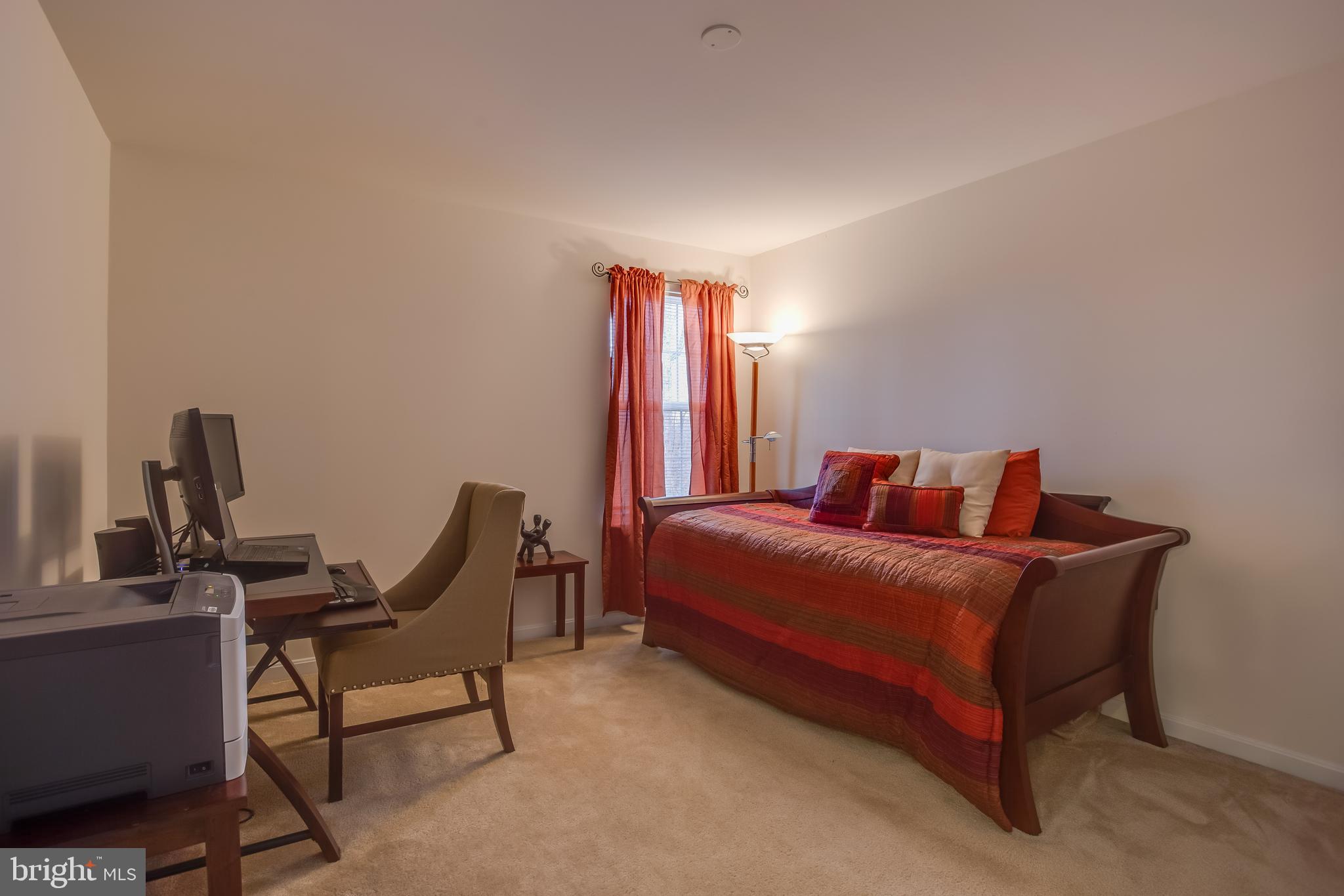 3437 Eagle Ridge Drive Woodbridge, VA 22191 - Photo 26 of 40 a bedroom with a bed and a window