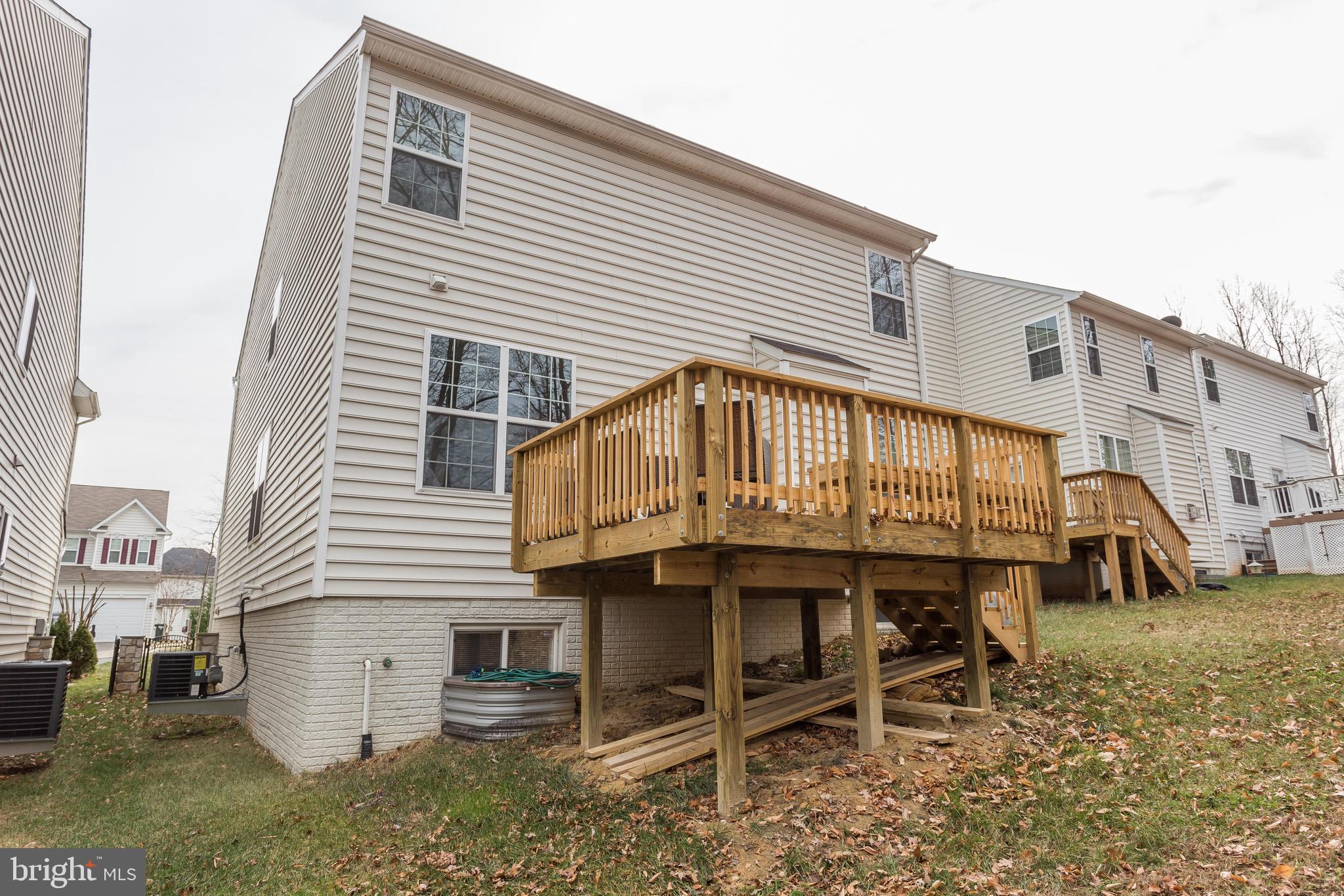 3437 Eagle Ridge Drive Woodbridge, VA 22191 - Photo 38 of 40 a white building with a outdoor space