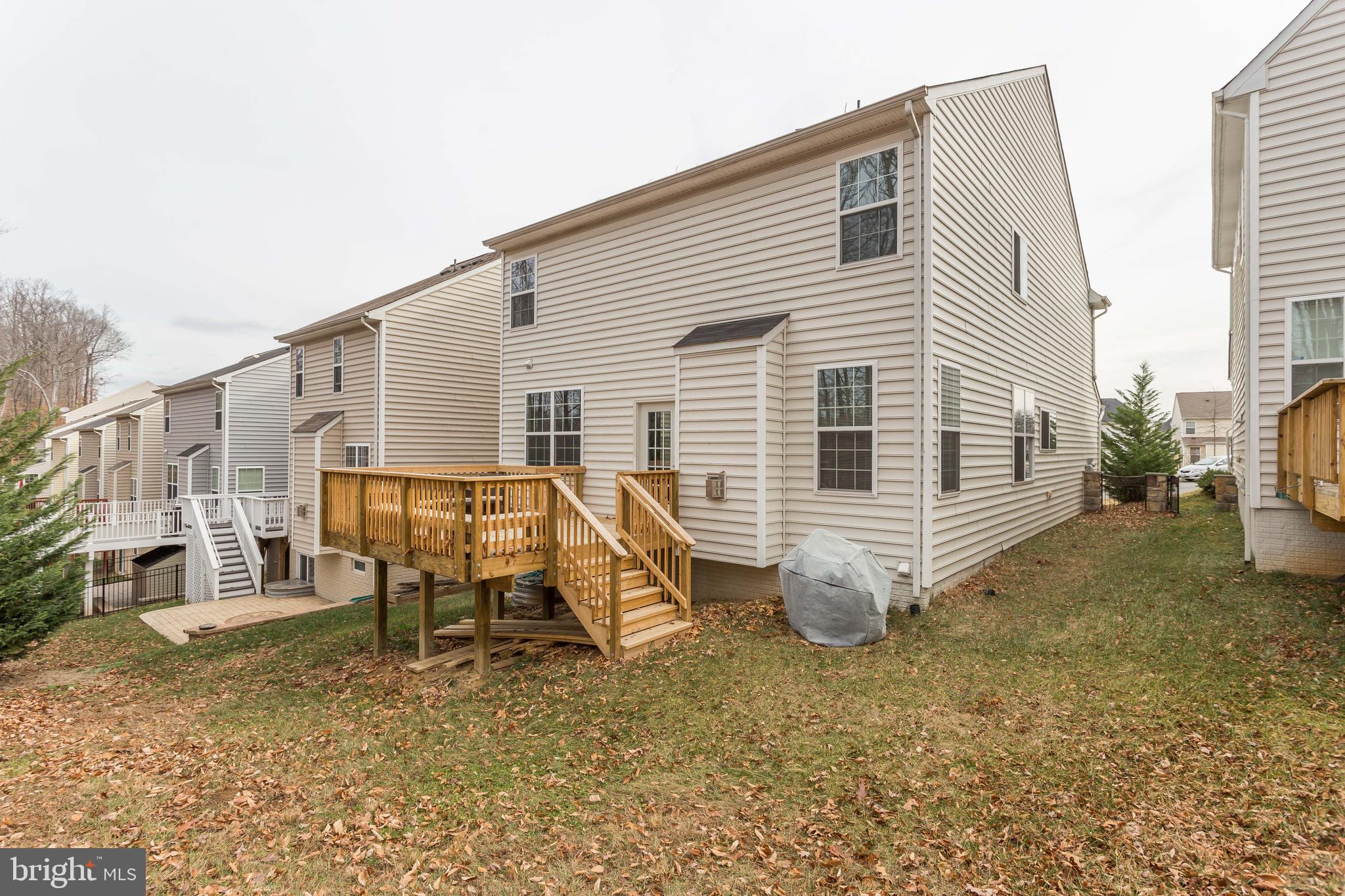 3437 Eagle Ridge Drive Woodbridge, VA 22191 - Photo 40 of 40 a view of a house with a yard