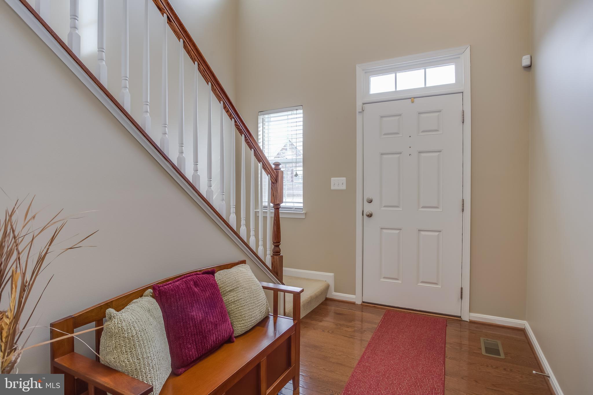 3437 Eagle Ridge Drive Woodbridge, VA 22191 - Photo 4 of 40 a view of livingroom with hardwood floor and stairs