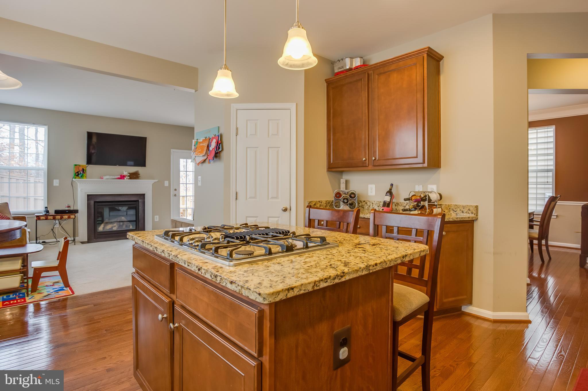 3437 Eagle Ridge Drive Woodbridge, VA 22191 - Photo 10 of 40 a kitchen with a stove a sink and a refrigerator