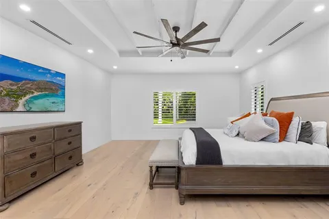 a bathroom with a sink vanity and a mirror