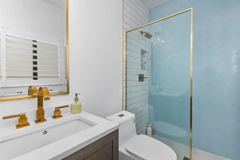 a view of a livingroom with furniture and window