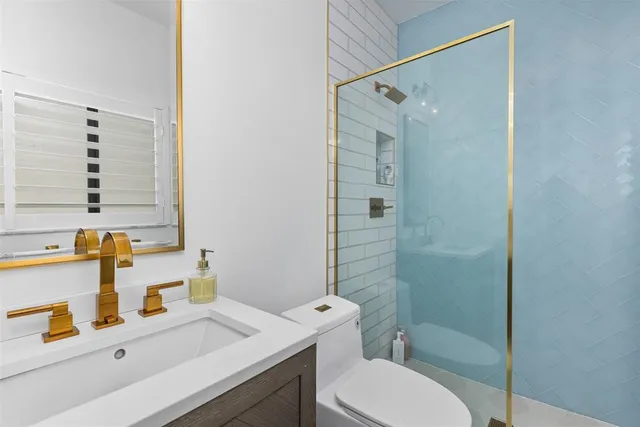 a view of a livingroom with furniture and window