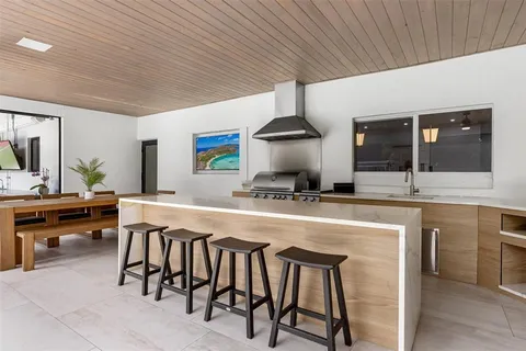 a kitchen with a stove and a microwave