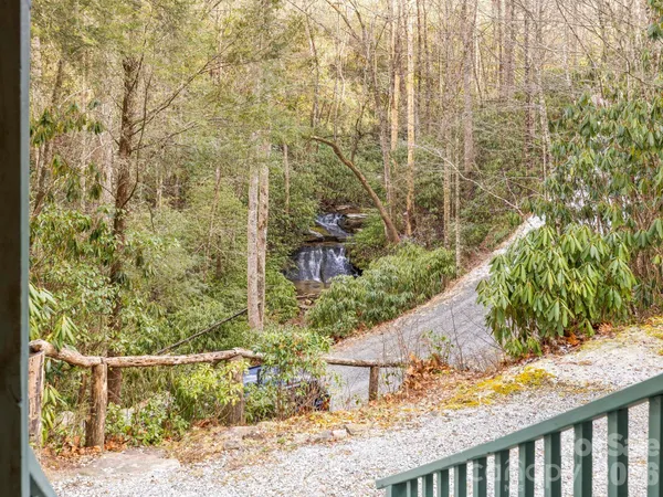a view of a garden from a balcony