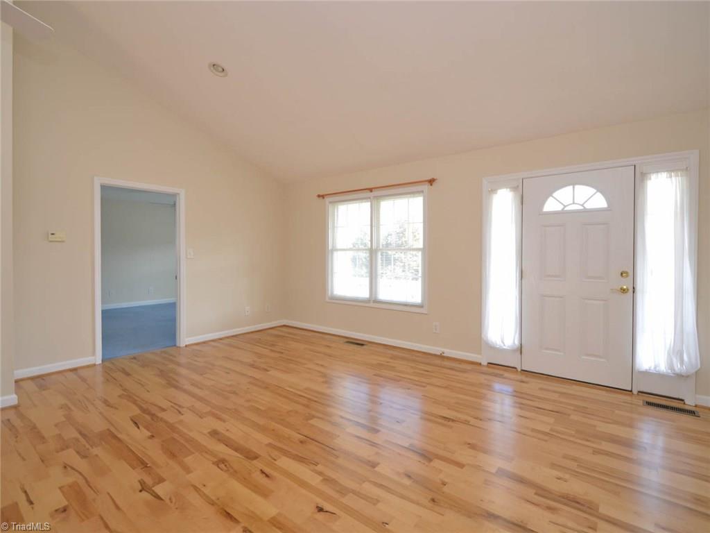 4900 Balsom Road Pfafftown, NC 27040 - Photo 2 of 21 Great Room with high ceilings and gorgeous wood floors