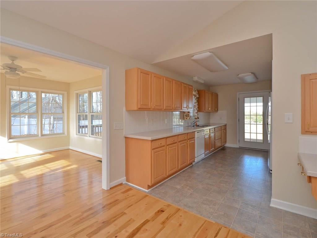 4900 Balsom Road Pfafftown, NC 27040 - Photo 7 of 21 Sun Room and Kitchen View