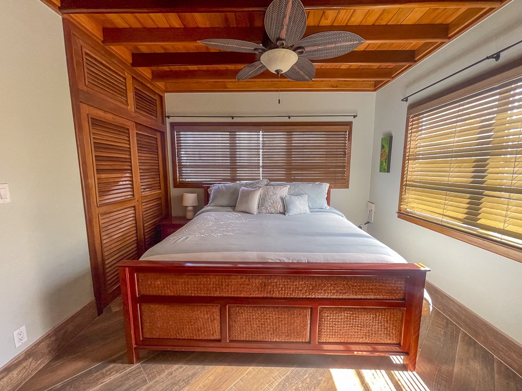 0 Belizean Shores, Unit 11B Robstown, TX 78380 - Photo 11 of 32 a bedroom with a bed and a window