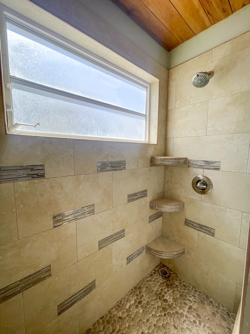 0 Belizean Shores, Unit 11B Robstown, TX 78380 - Photo 15 of 32 a bathroom with a toilet and a shower