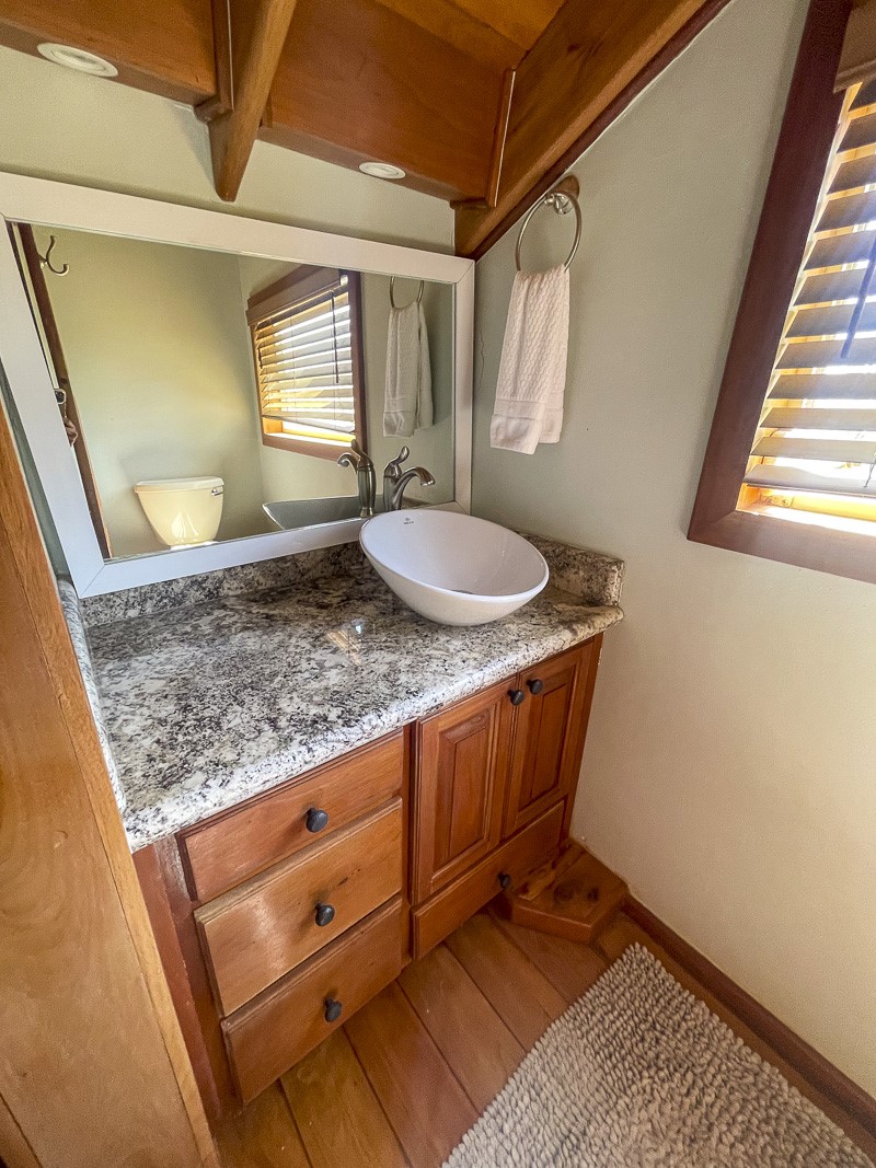 0 Belizean Shores, Unit 11B Robstown, TX 78380 - Photo 19 of 32 a room with granite countertop furniture and a mirror
