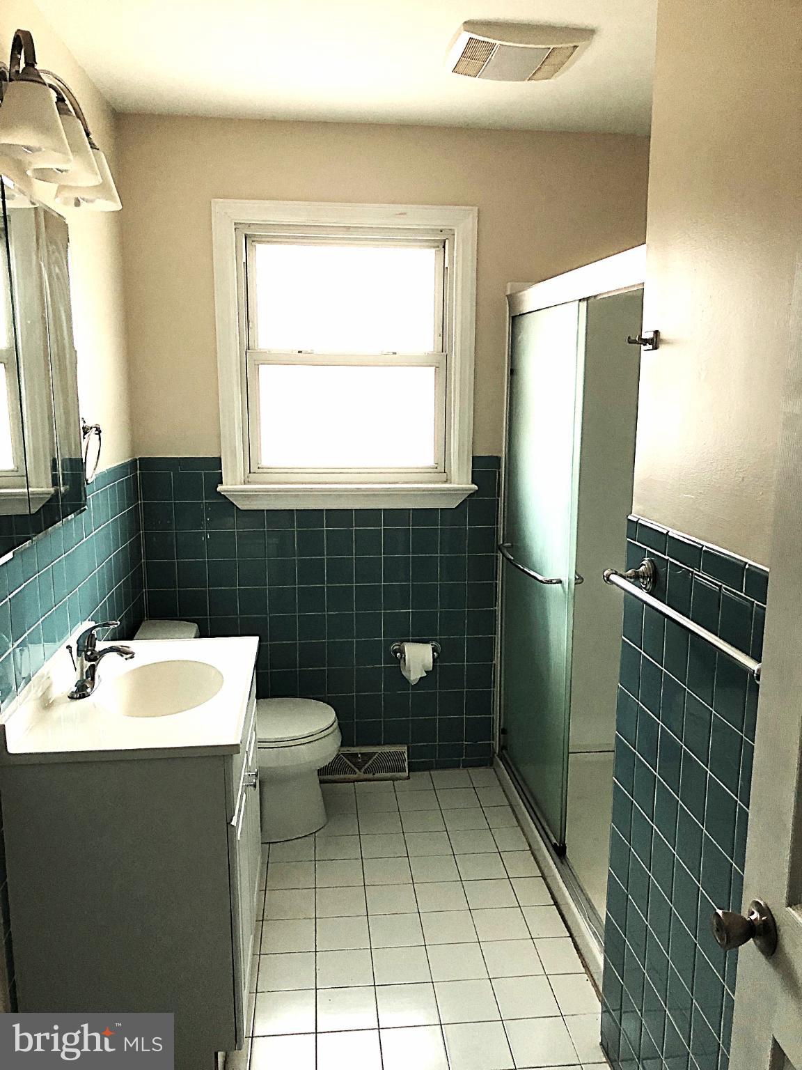 8 Roberts Lane Berlin, NJ 08009 - Photo 13 of 19 a bathroom with a sink a toilet and mirror