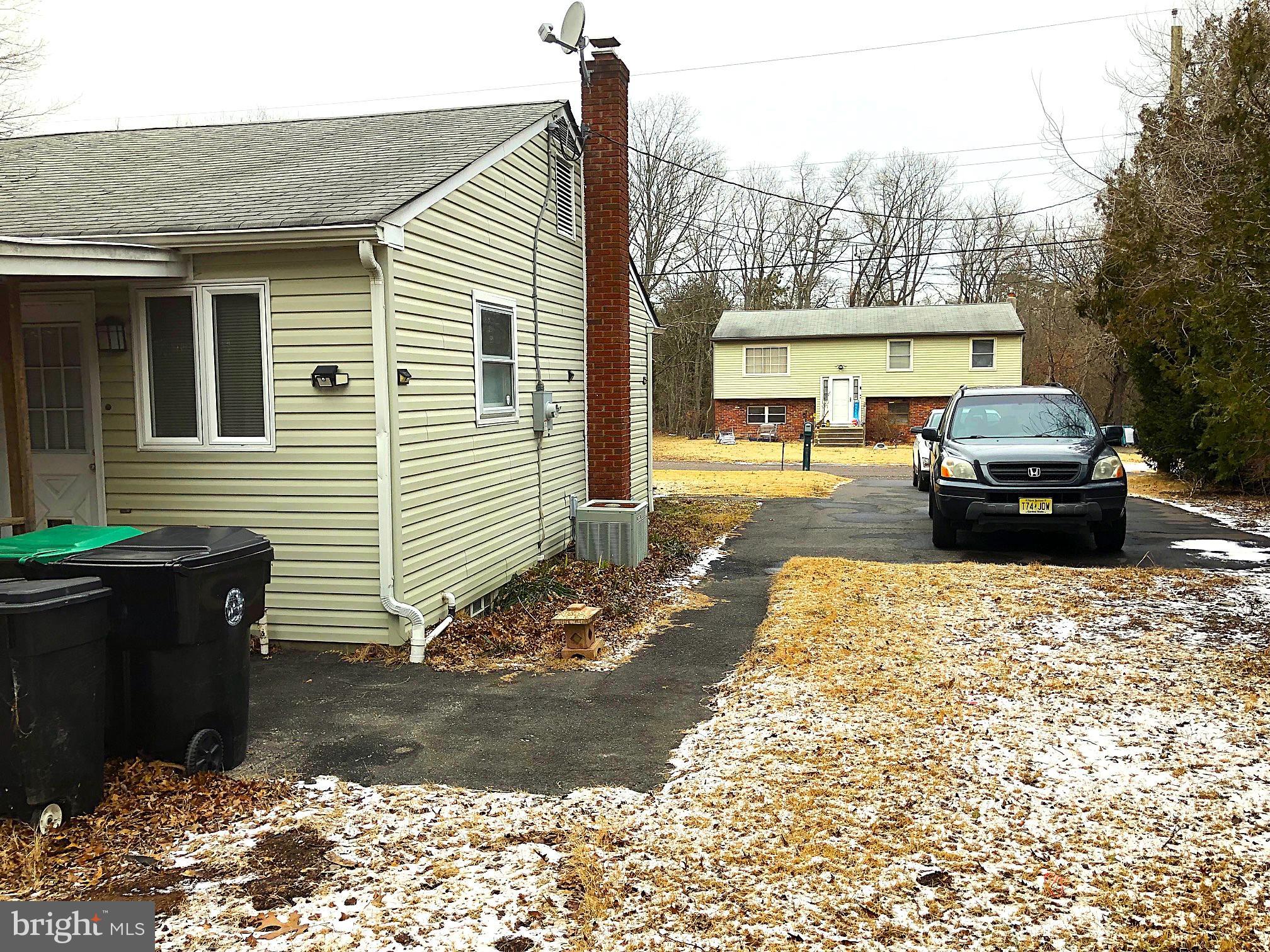 8 Roberts Lane Berlin, NJ 08009 - Photo 5 of 19 a view of a house with a patio