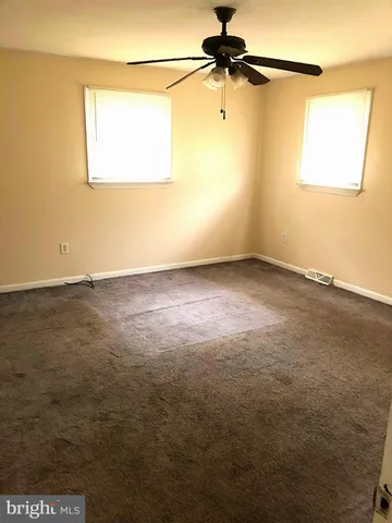 a view of a room with an empty space