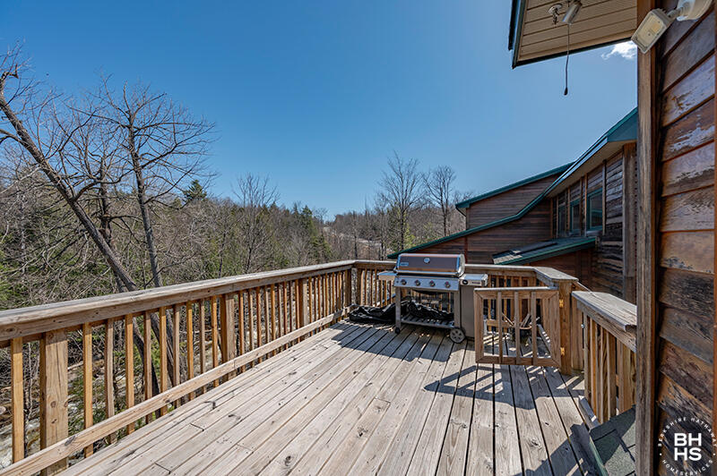 667 Days Mills Road St. Regis Falls, NY 12980 - Photo 44 of 51 HomeOnLakeOzoniaOutlet_GuestCottage_Deck