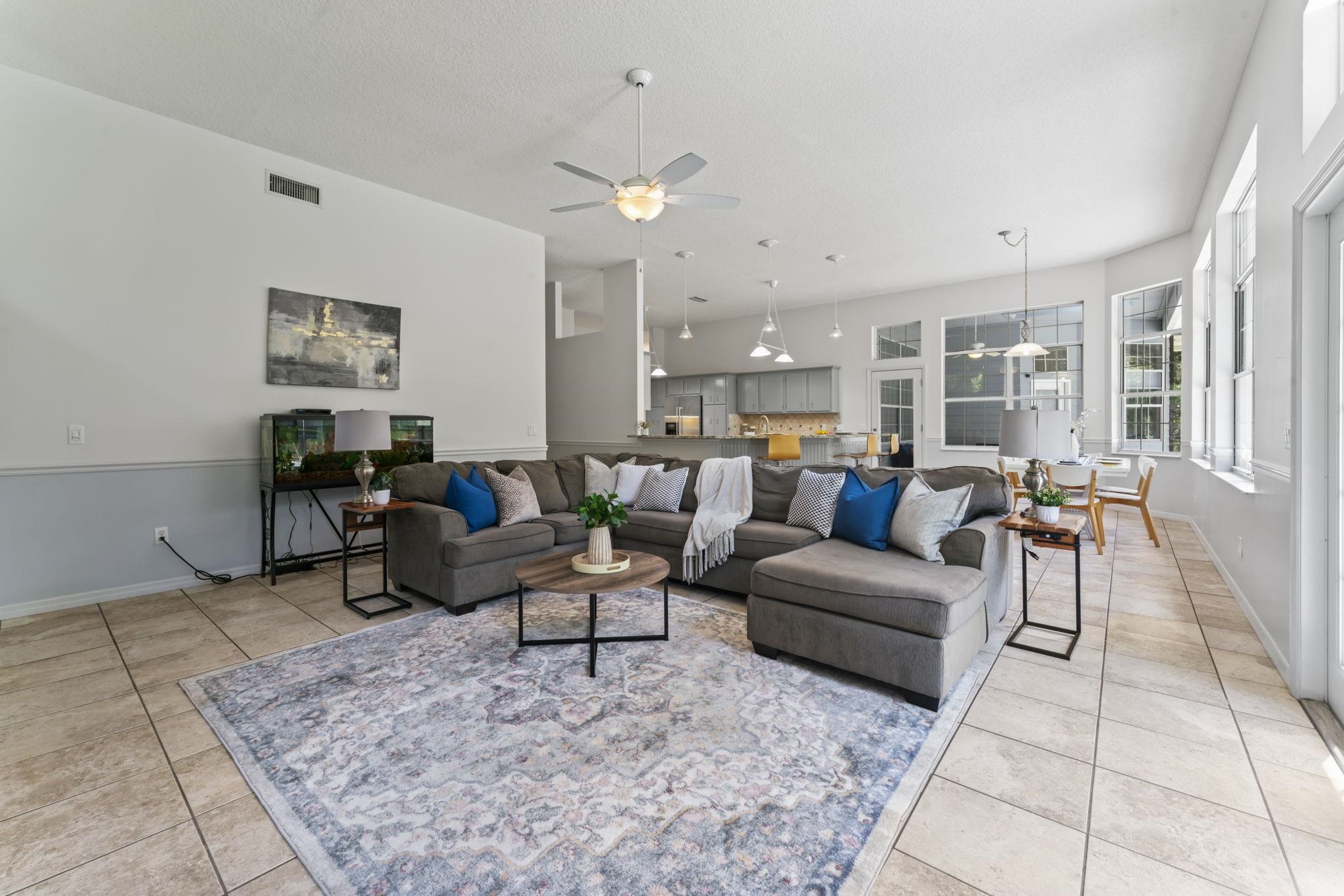 795 Kings Estate Road St. Augustine, FL 32086 - Photo 26 of 90 a living room with furniture and a rug