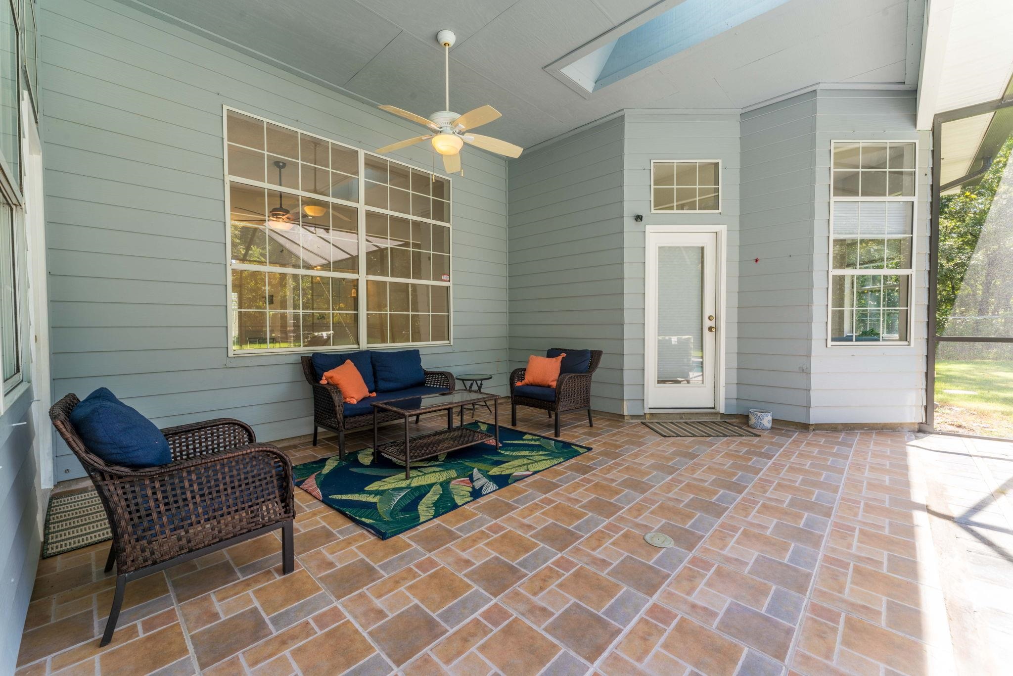 795 Kings Estate Road St. Augustine, FL 32086 - Photo 50 of 90 a outdoor living space with furniture and a window
