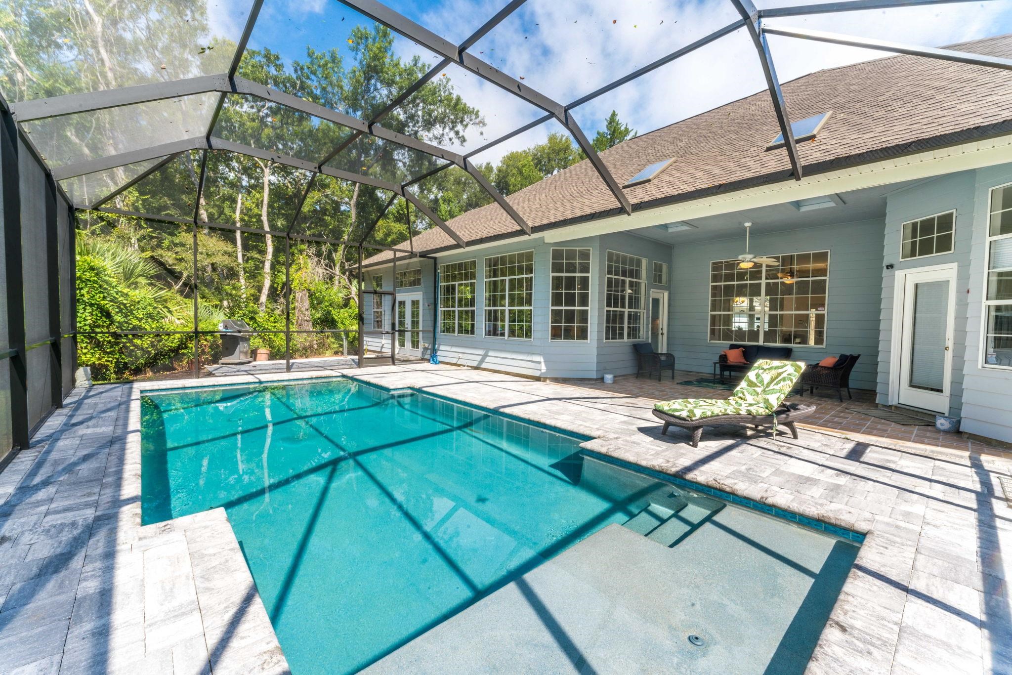 795 Kings Estate Road St. Augustine, FL 32086 - Photo 56 of 90 a view of a house with backyard and sitting area