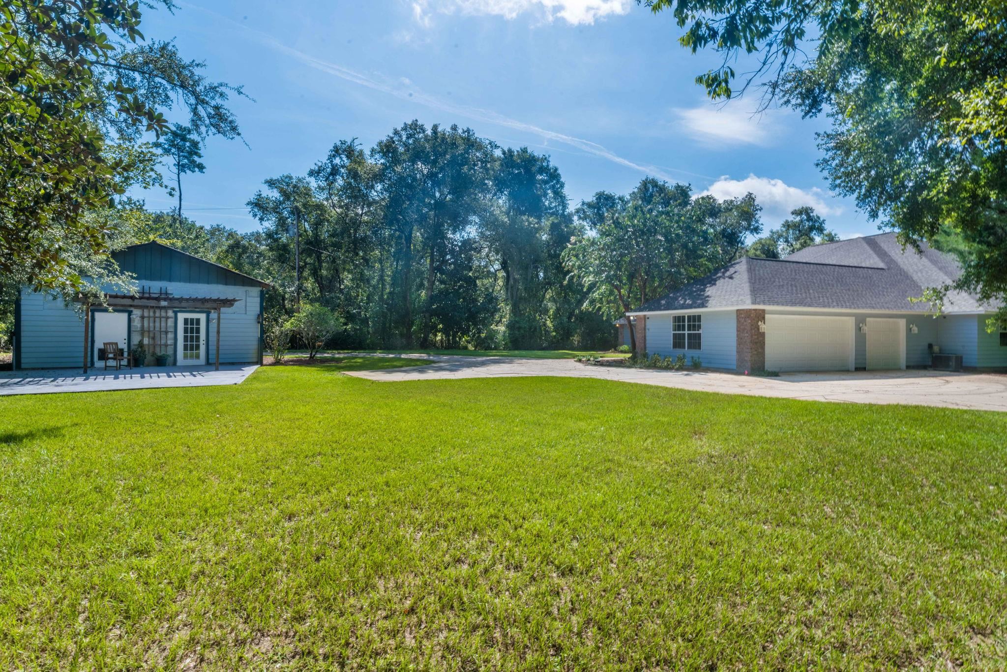 795 Kings Estate Road St. Augustine, FL 32086 - Photo 60 of 90 a house view with swimming pool in front of it