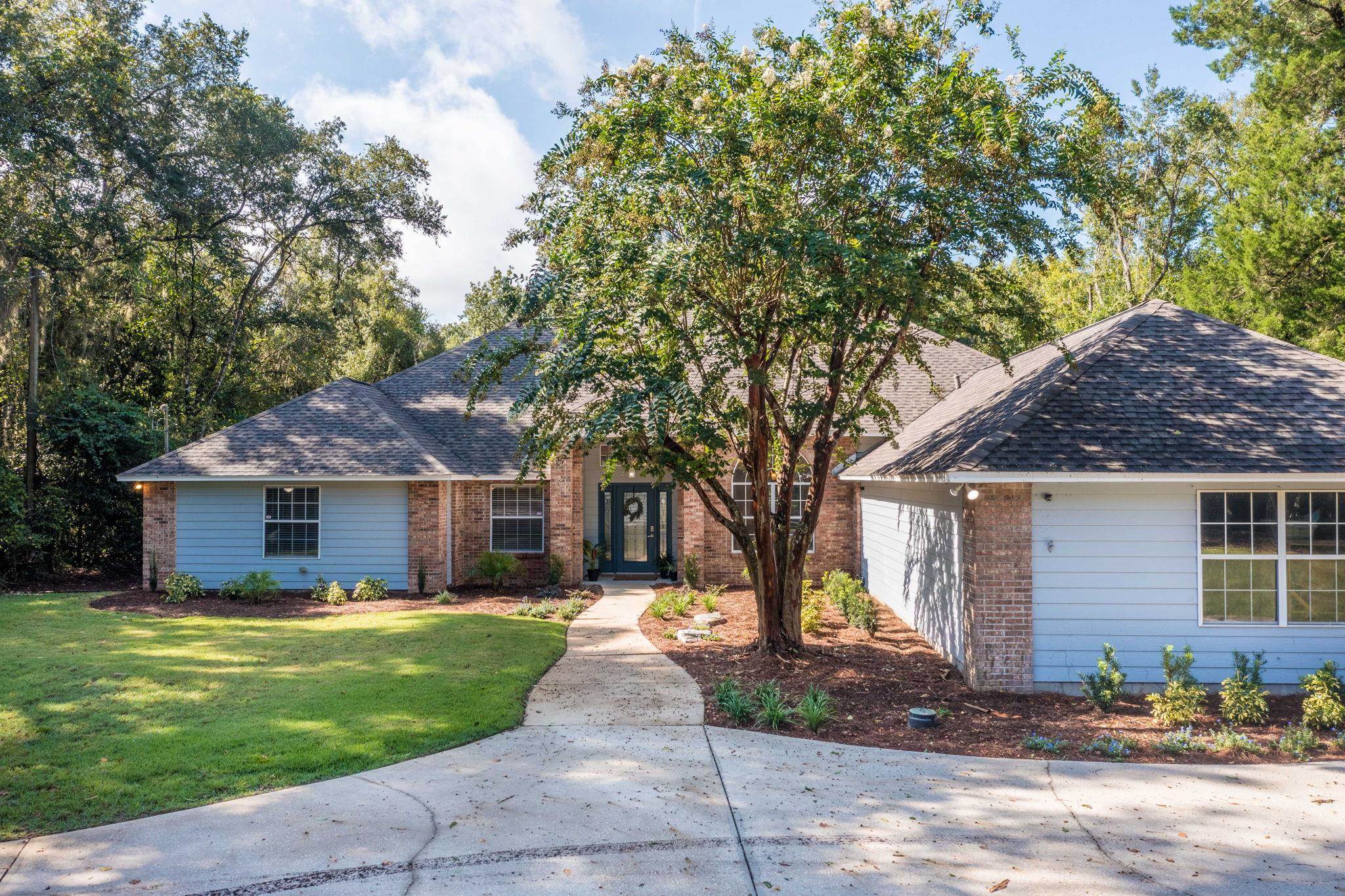 795 Kings Estate Road St. Augustine, FL 32086 - Photo 75 of 90 a front view of a house with a yard