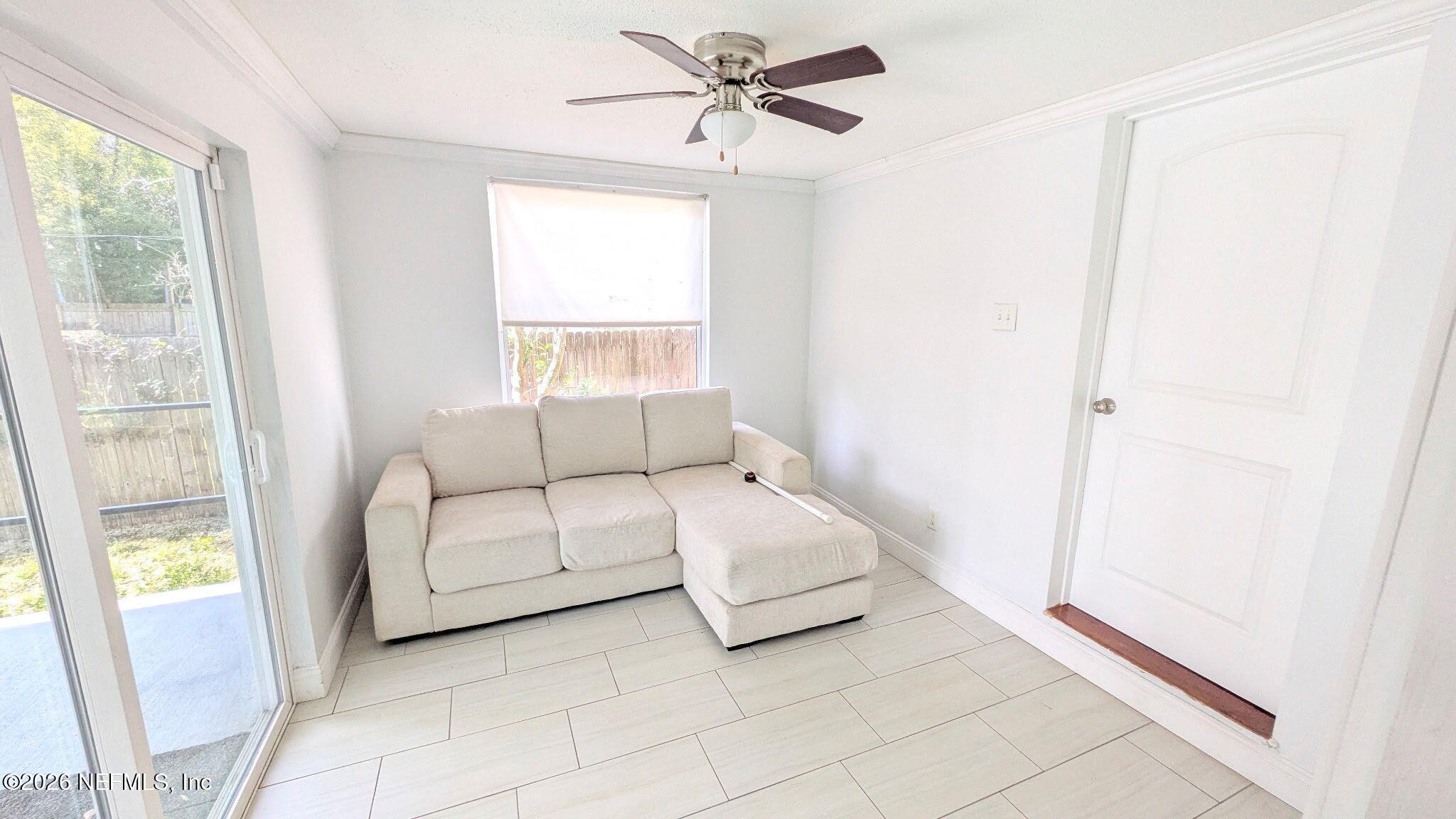 1218 Dancy Street Jacksonville, FL 32205 - Photo 16 of 19 a spacious bedroom with a bed and a window