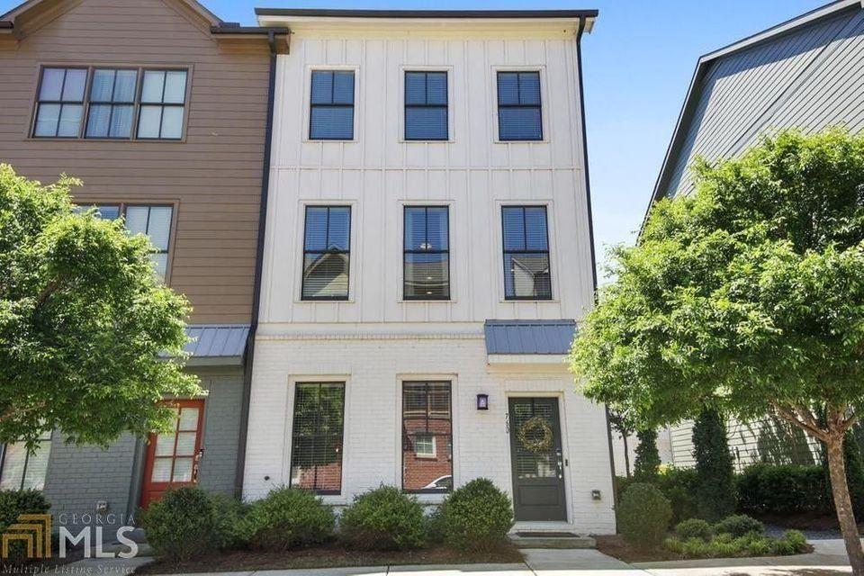 a view of a building with a tree