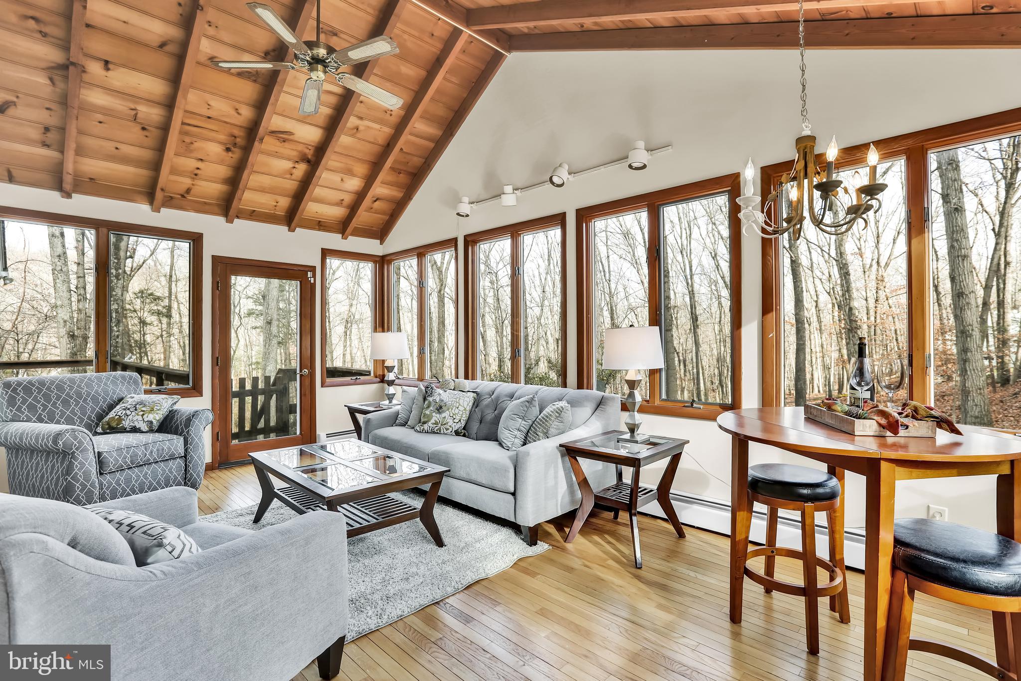 7062 Ely Road New Hope, PA 18938 - Photo 13 of 33 Sunroom Featuring Exposed Beams And Scenic Views
