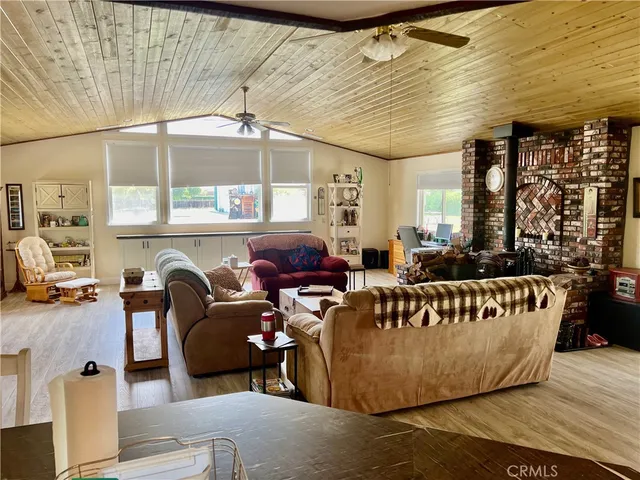 a kitchen with counter top space a sink and appliances