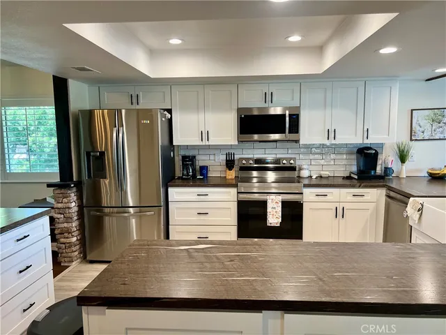 a view of front door with wooden floor