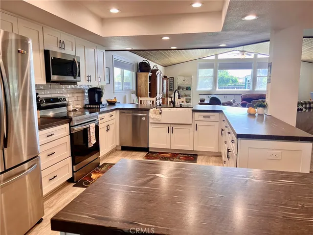 a workspace with furniture and a window