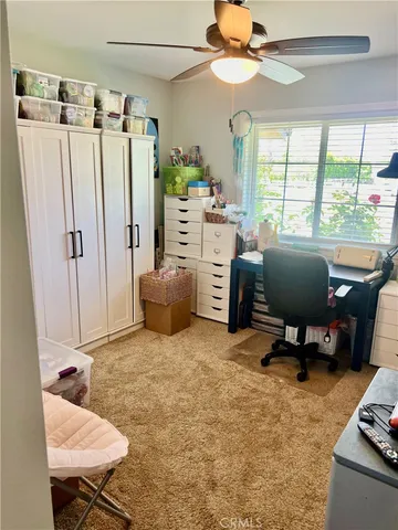 a view of a chairs and tables in patio