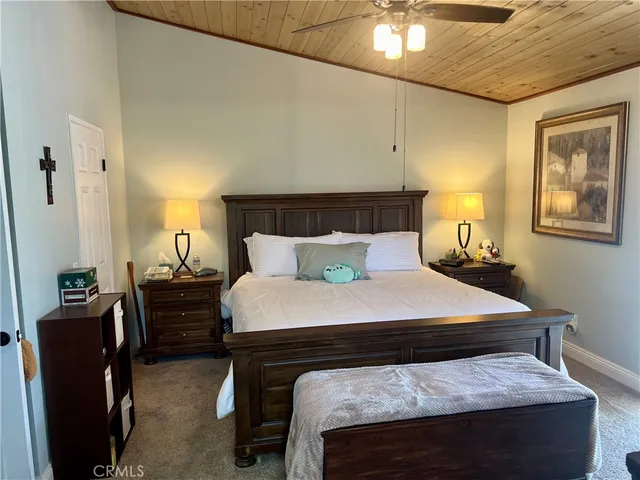 a view of a swimming pool with a table and chairs