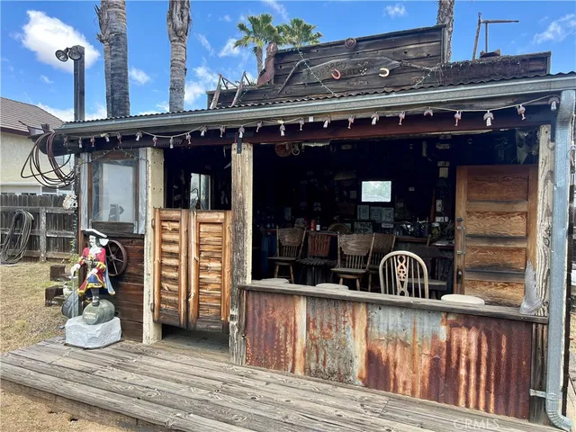 a front view of a building with an outdoor space