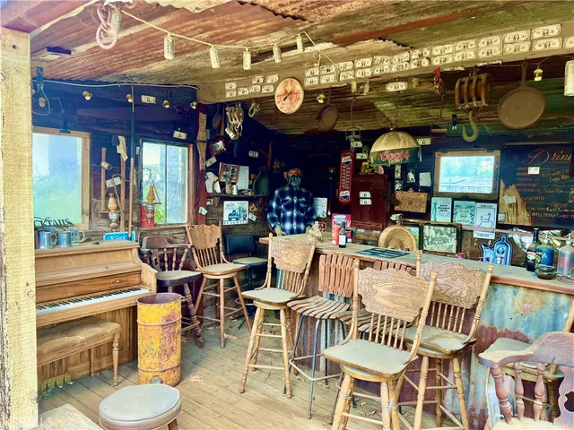 a view of a street with houses on both side