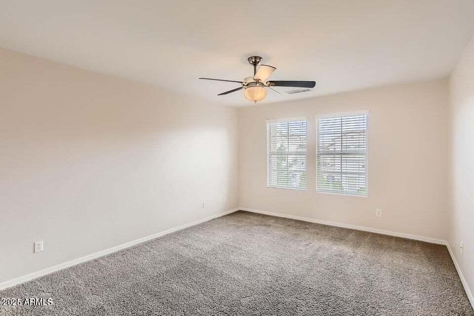 2039 West Kathleen Road Phoenix, AZ 85023 - Photo 16 of 33 a view of an empty room with a window