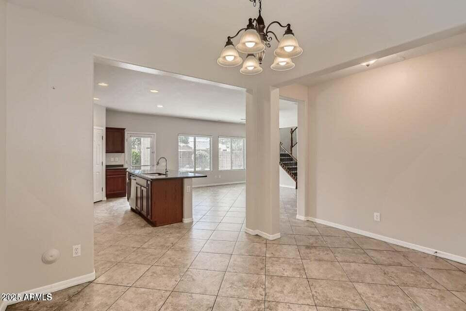 2039 West Kathleen Road Phoenix, AZ 85023 - Photo 7 of 33 a large kitchen with a counter space and stainless steel appliances