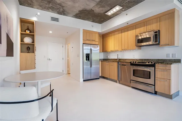 a living room with furniture and a couch