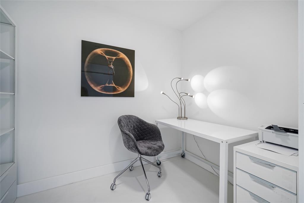 2001 Meridian Avenue, Unit 318 Miami Beach, FL 33139 - Photo 19 of 37 a workspace with furniture and mirror