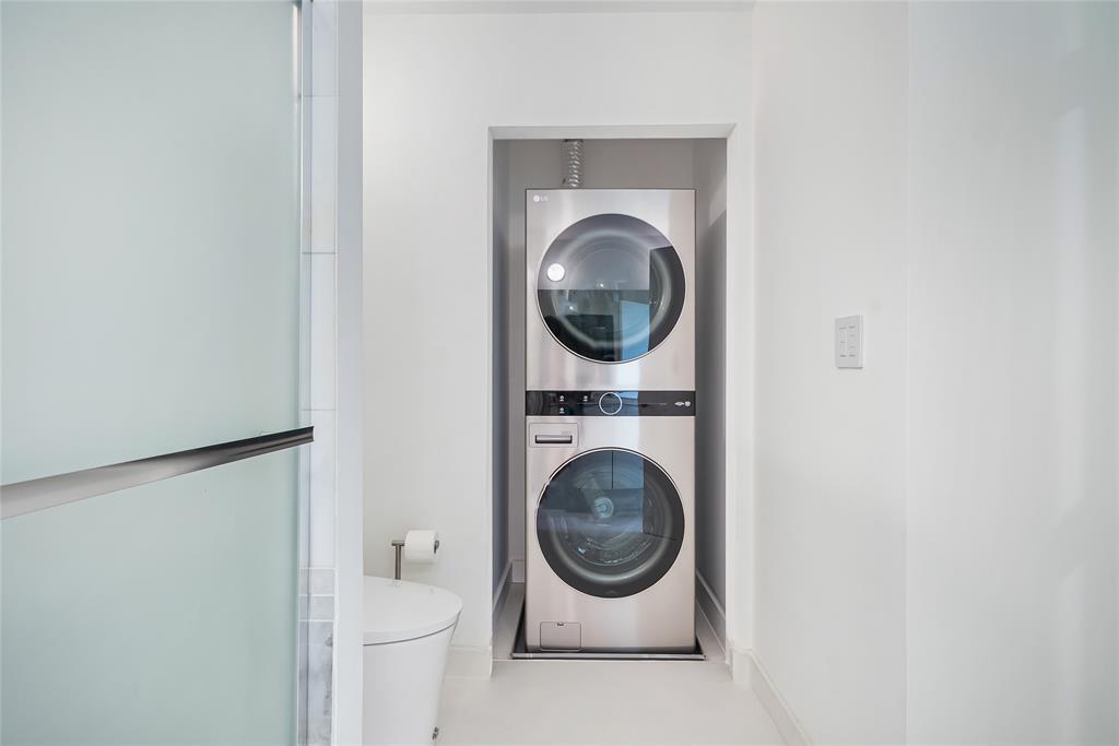 2001 Meridian Avenue, Unit 318 Miami Beach, FL 33139 - Photo 27 of 37 a utility room with dryer and washer