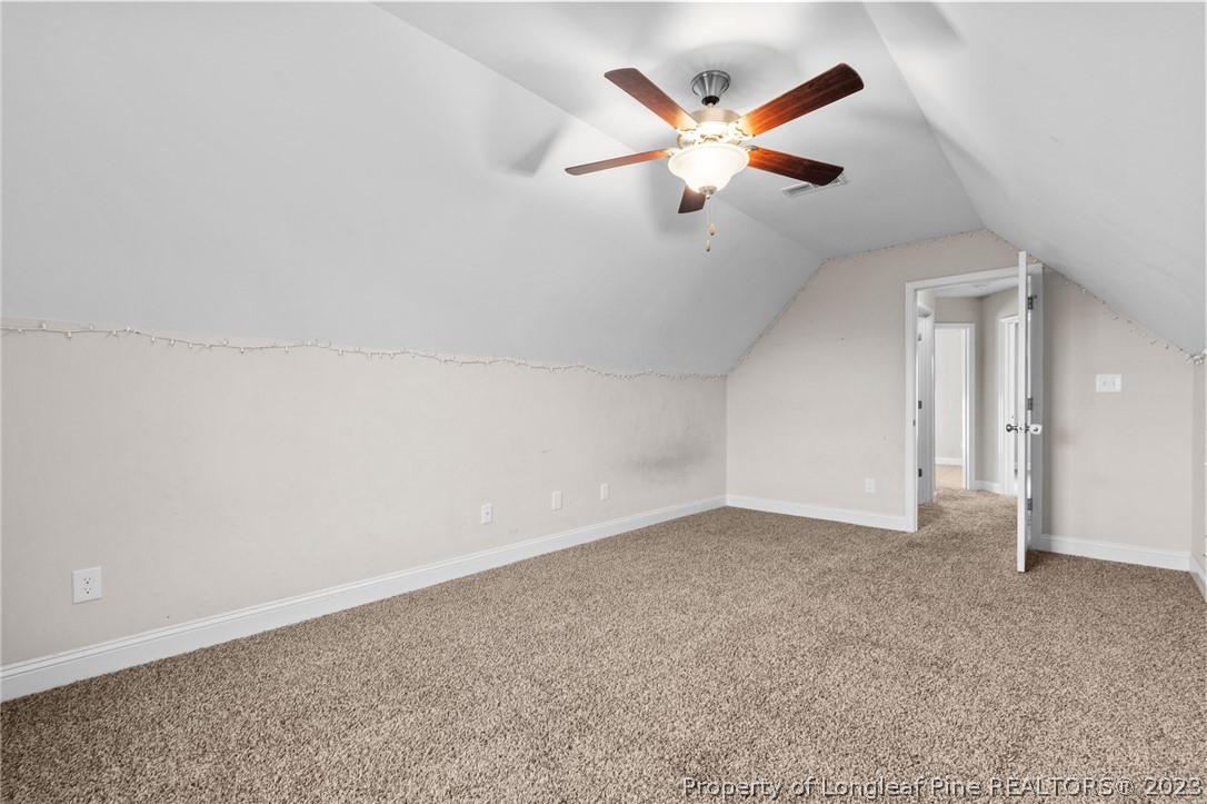 108 Roy's Ridge Raeford, NC 28376 - Photo 24 of 32 an empty room with ceiling fan and window