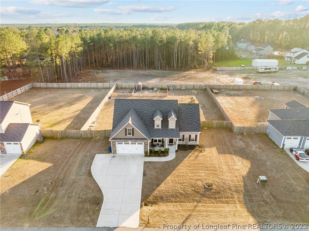 108 Roy's Ridge Raeford, NC 28376 - Photo 28 of 32 a view of a swimming pool with a patio and a ocean view