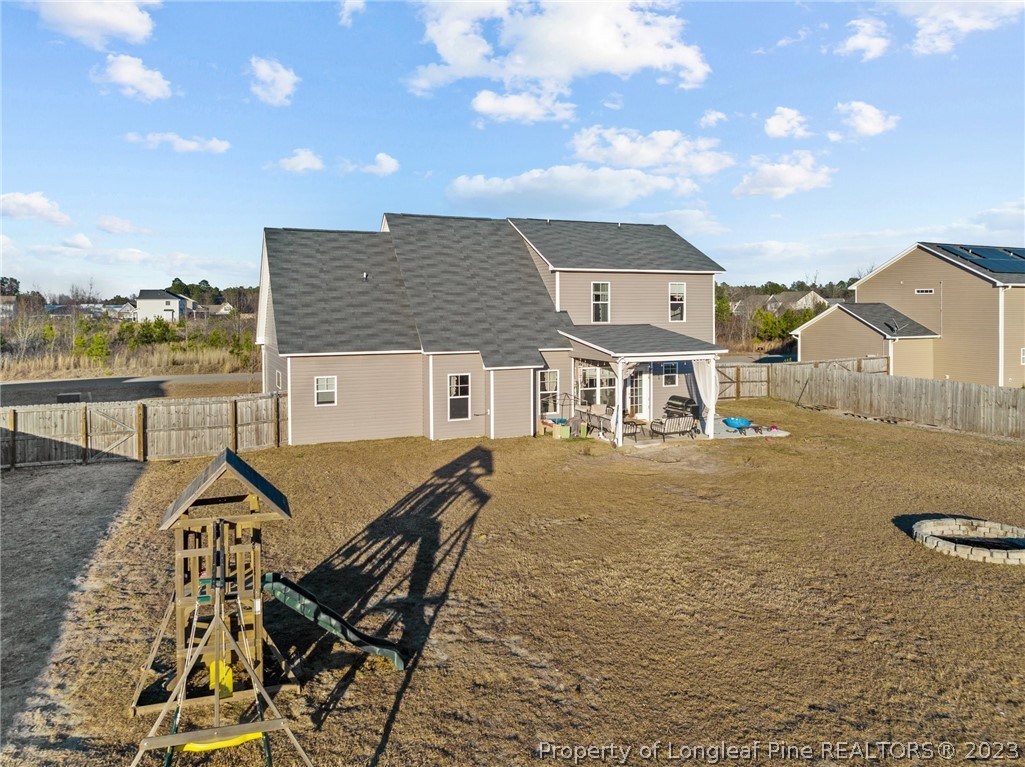 108 Roy's Ridge Raeford, NC 28376 - Photo 32 of 32 a front view of a house with swimming pool and ocean view