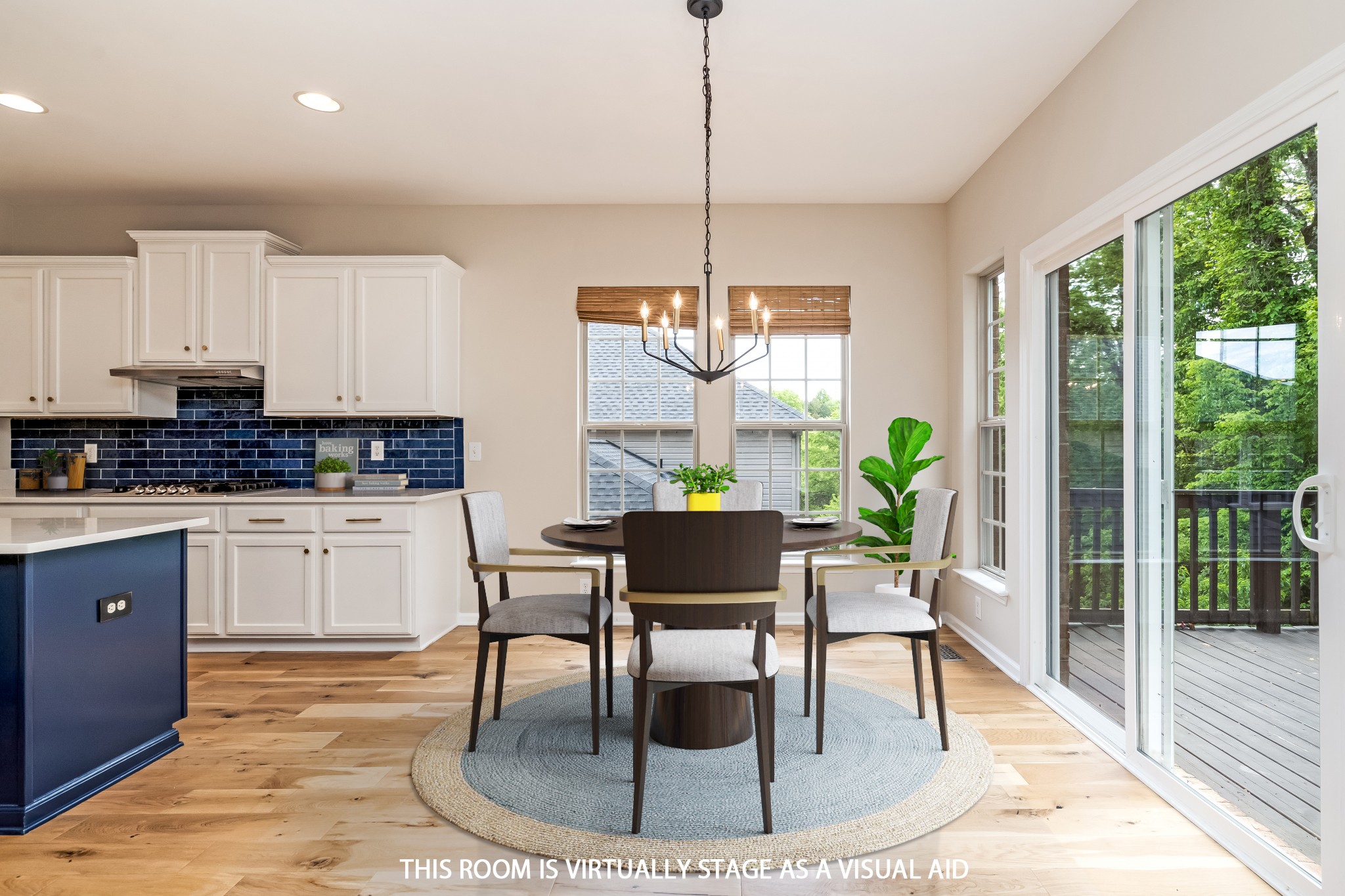 1508 Simpson Court Nashville, TN 37211 - Photo 12 of 41 a kitchen with granite countertop a table chairs and wooden floor