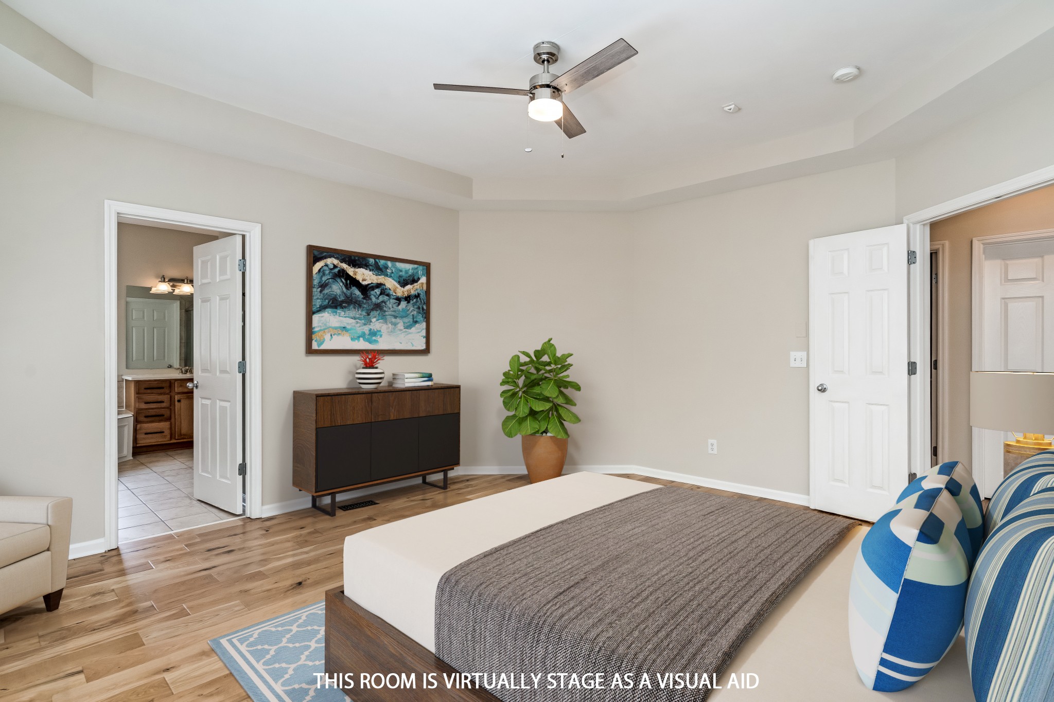 1508 Simpson Court Nashville, TN 37211 - Photo 15 of 41 a bedroom with a bed dresser and a wooden floor
