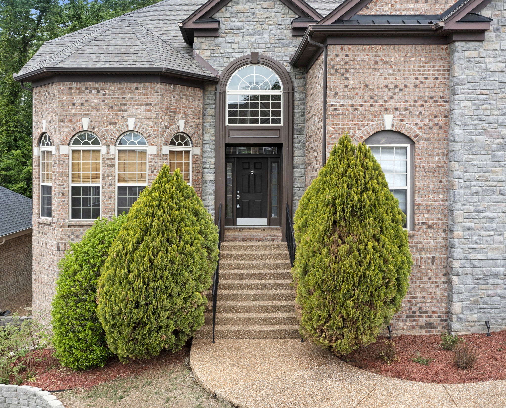 1508 Simpson Court Nashville, TN 37211 - Photo 2 of 41 a front view of a house with garden