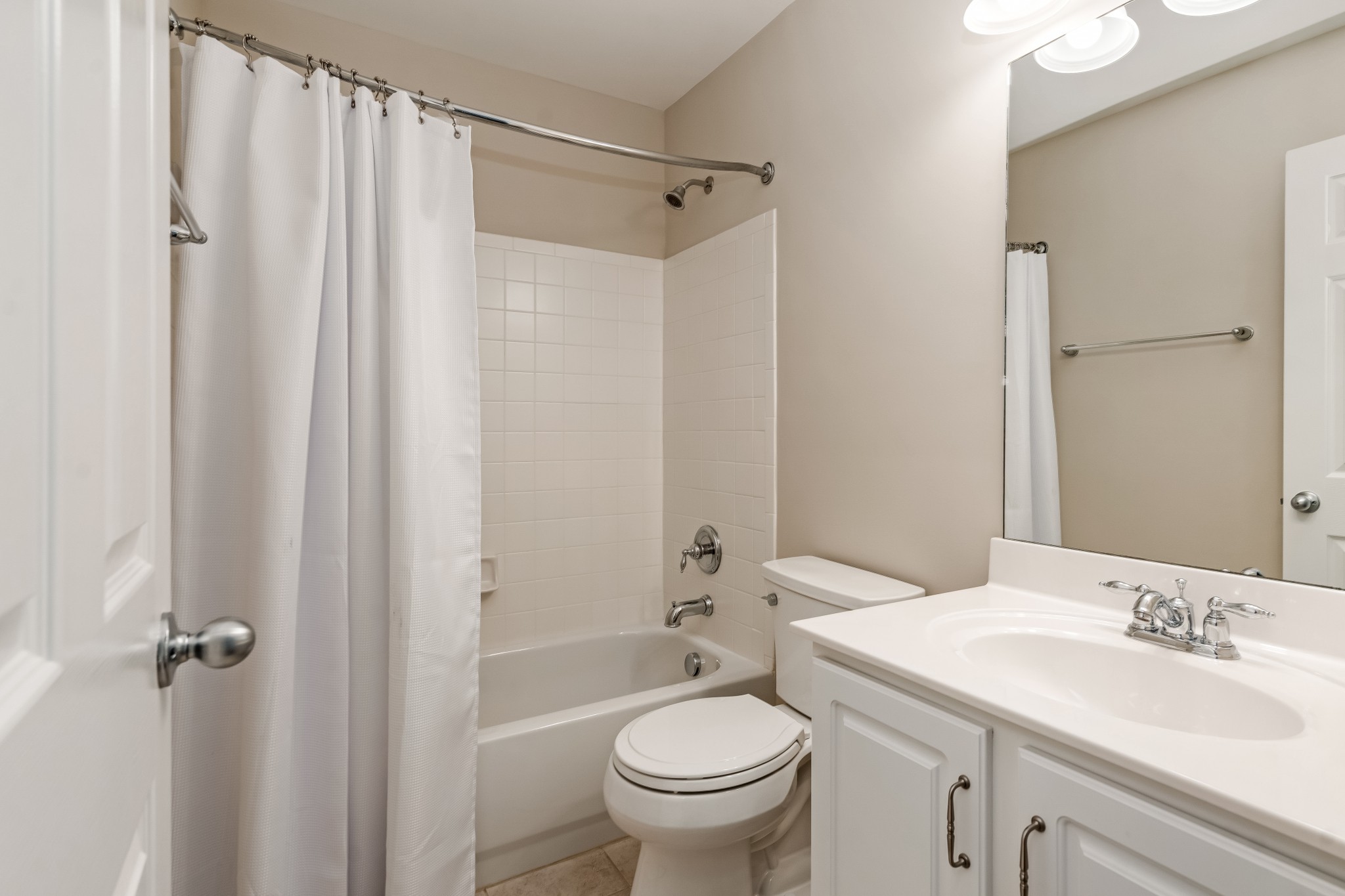 1508 Simpson Court Nashville, TN 37211 - Photo 22 of 41 a bathroom with a granite countertop sink toilet and shower