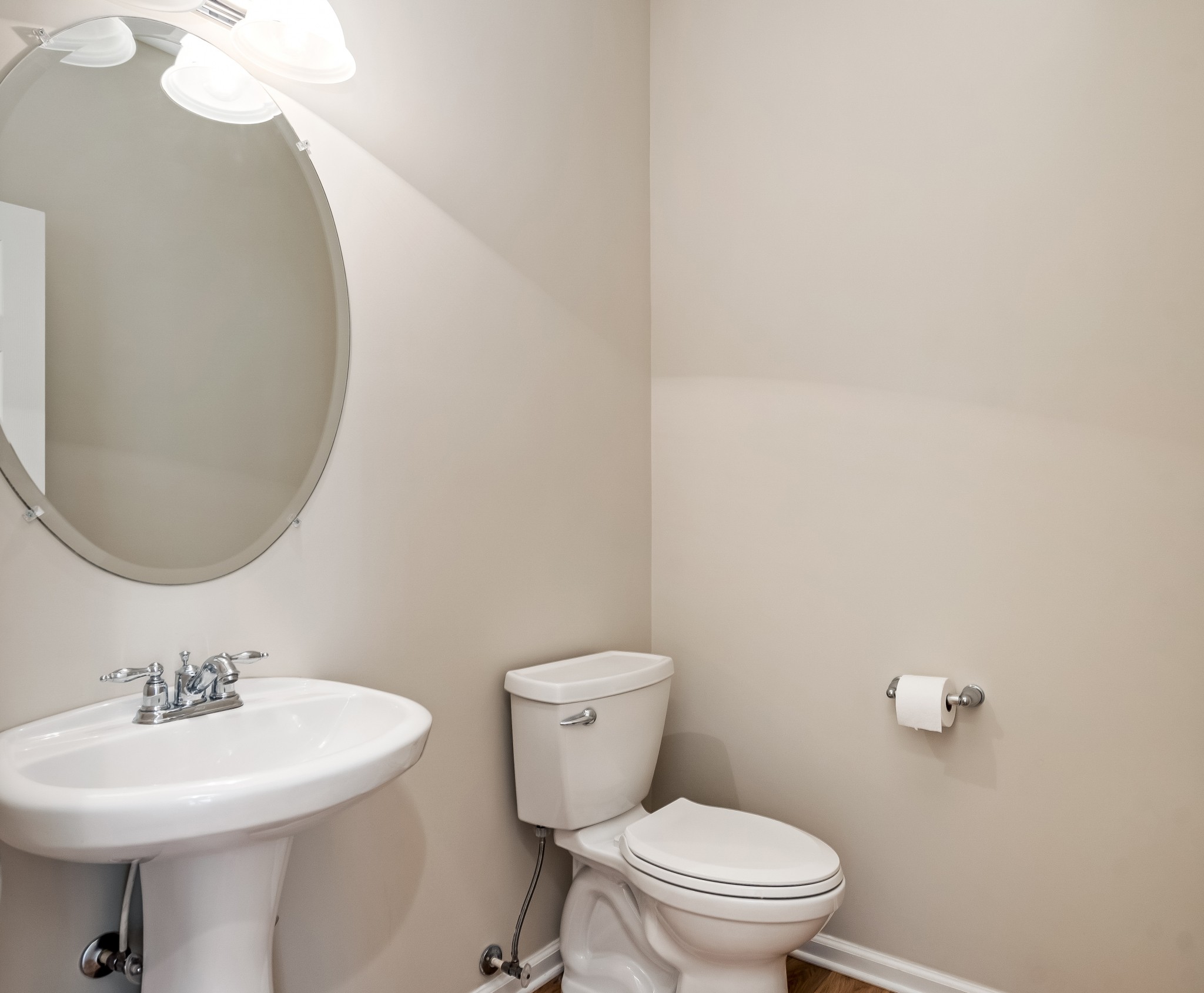 1508 Simpson Court Nashville, TN 37211 - Photo 26 of 41 a bathroom with a sink a toilet and mirror
