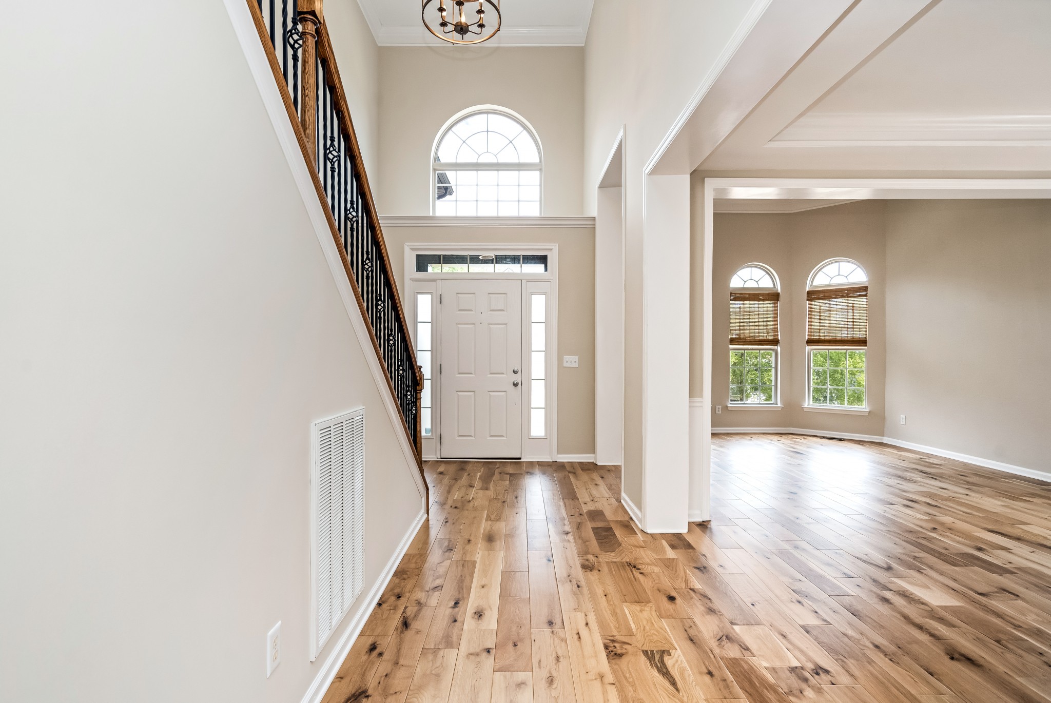 1508 Simpson Court Nashville, TN 37211 - Photo 4 of 41 a view of a hallway with wooden floor and staircase