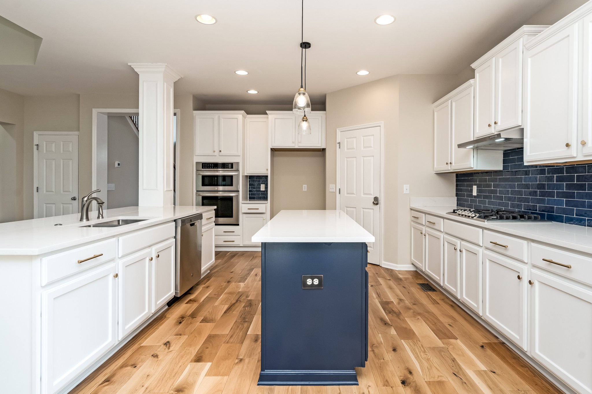 1508 Simpson Court Nashville, TN 37211 - Photo 10 of 41 a kitchen with kitchen island a counter top space appliances and a cabinets